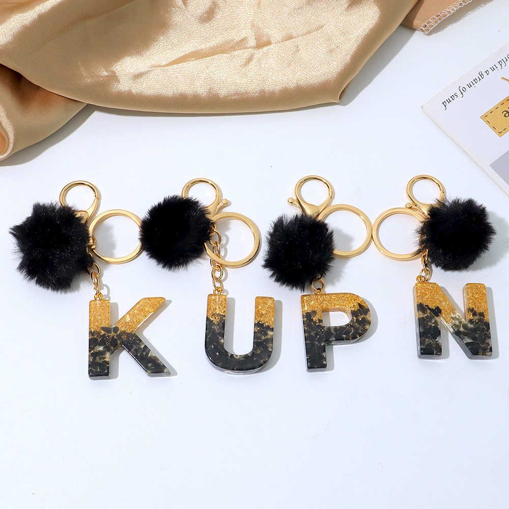 Schattige zwarte pompom A-Z in - Resin Art Alphabet recensie en prijs