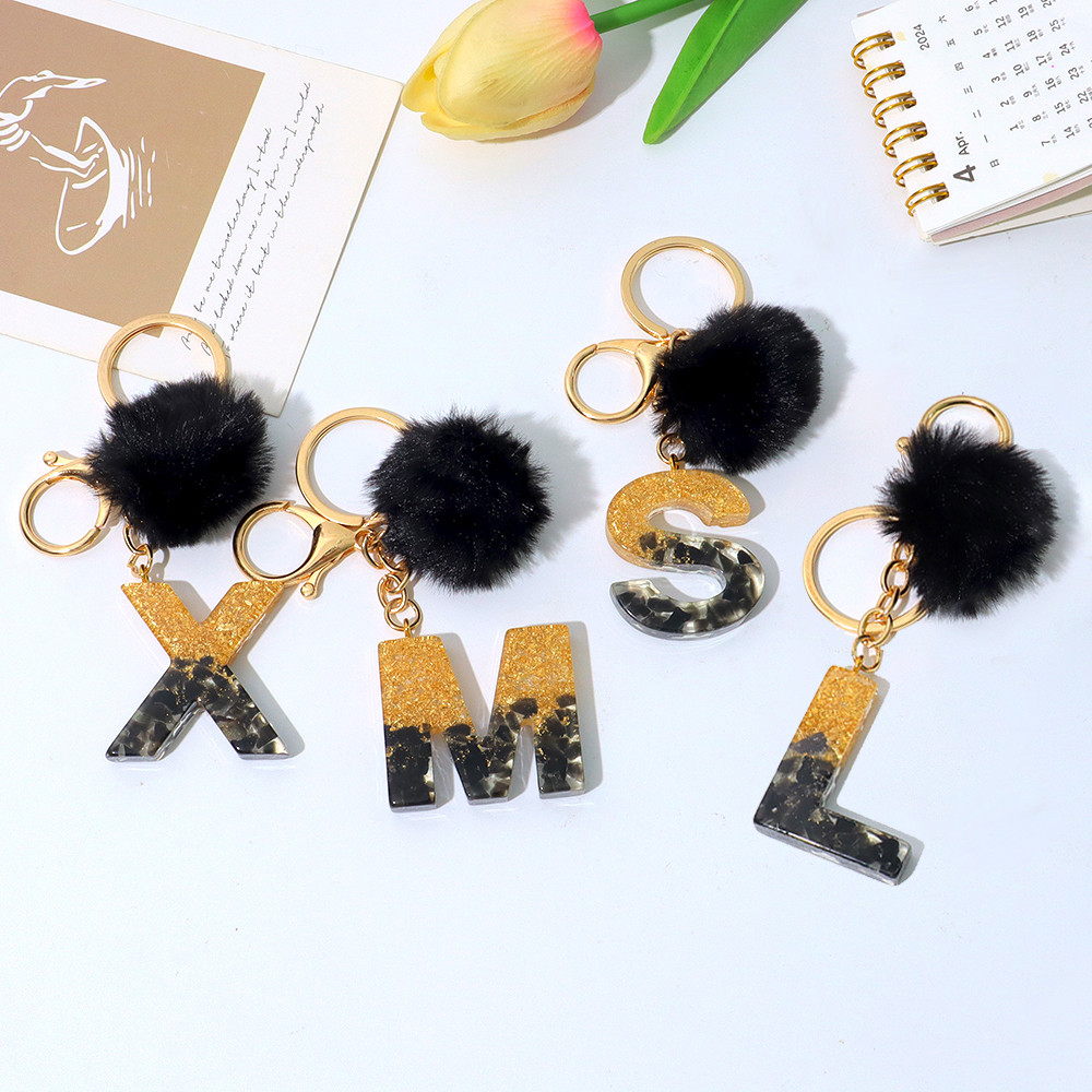 Schattige zwarte pompom A-Z in - Resin Art Alphabet recensie en prijs