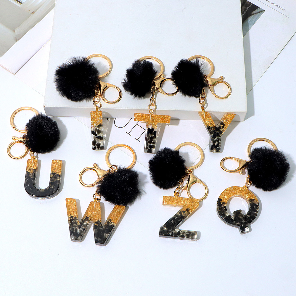Schattige zwarte pompom A-Z in - Resin Art Alphabet recensie en prijs